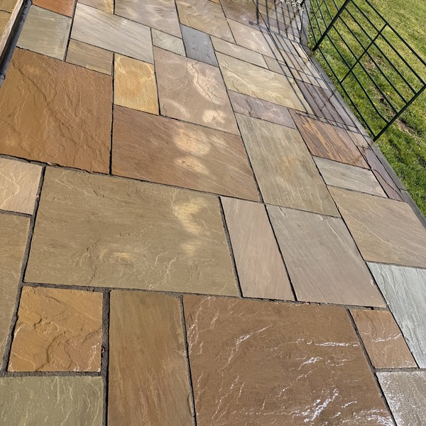 Indian sandstone patio in Uttoxeter after cleaning by Ultra Clean Exteriors